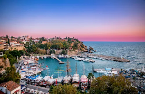 Turkey, Antalya - Summer beach sunset at Kaleiçi old town port on the Mediterranean Sea