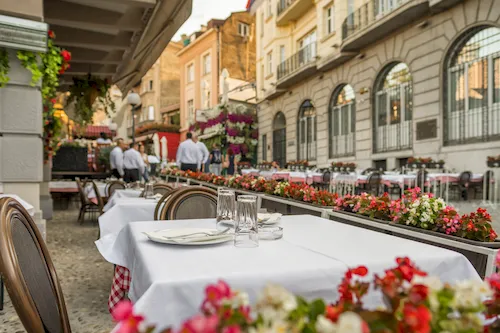Serbia, Belgrade - Cozy outdoor restaurant in the city center in summer