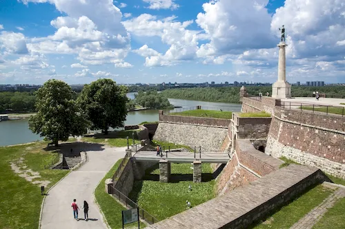 Serbia, Belgrade - Confluence of the river Sava with the beautiful view on the Kalemegdan fortress and the Pobednik monument