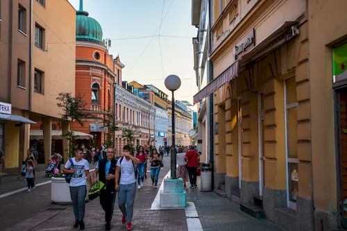 Bosnia and Herzegovina, Banja Luka - Street in the city center and main square at evening. Banja Luka is the capital of Republika Srpska