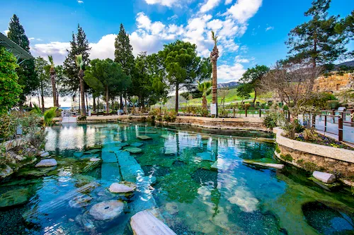 Turkey, Pamukkale - View of the Antique Pool (Cleopatra's Bath). Popular touristic destination during a Pamukkale visit