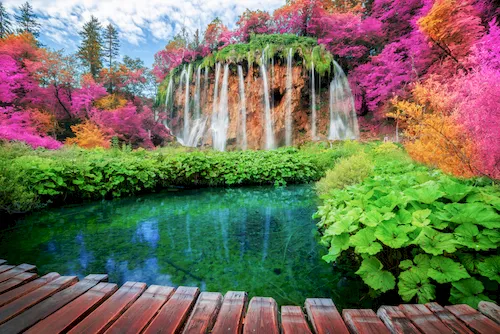 Croatia, Plitvice Lakes National Park - Beautiful wooden path for nature trekking with lakes and waterfalls.