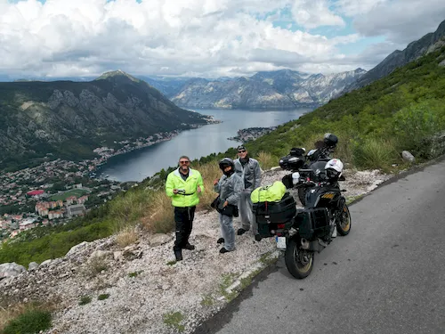 Pirata en Moto group of motorcyclists taking a break at the Bay of Kotor (Boka Kotorska) in Montenegro