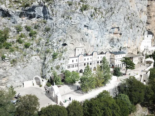 Montenegro, Ostrog Monastery built into the cliffs above the Zeta Valley