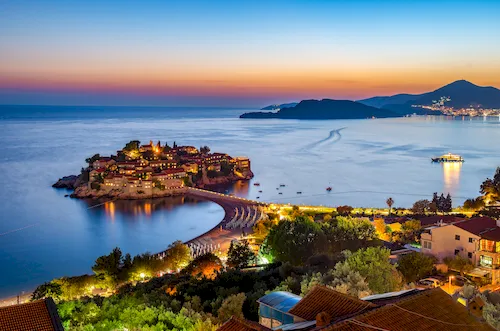 Montenegro, Sveti Stefan - Sunset on the seacoast at the popular travel destination