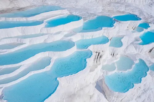 Turkey, Pamukkale - Pamukkale travertine pools, natural terraces with blue water