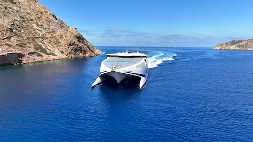 Greece, Sifnos Island - High-speed Seajet Champion 2 passenger vessel departing from the port