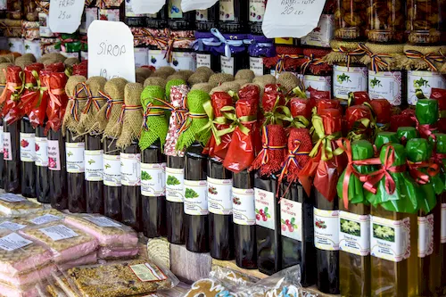 Romania - Sweet berry and coniferous syrups at a roadside store on the Transfăgărășan